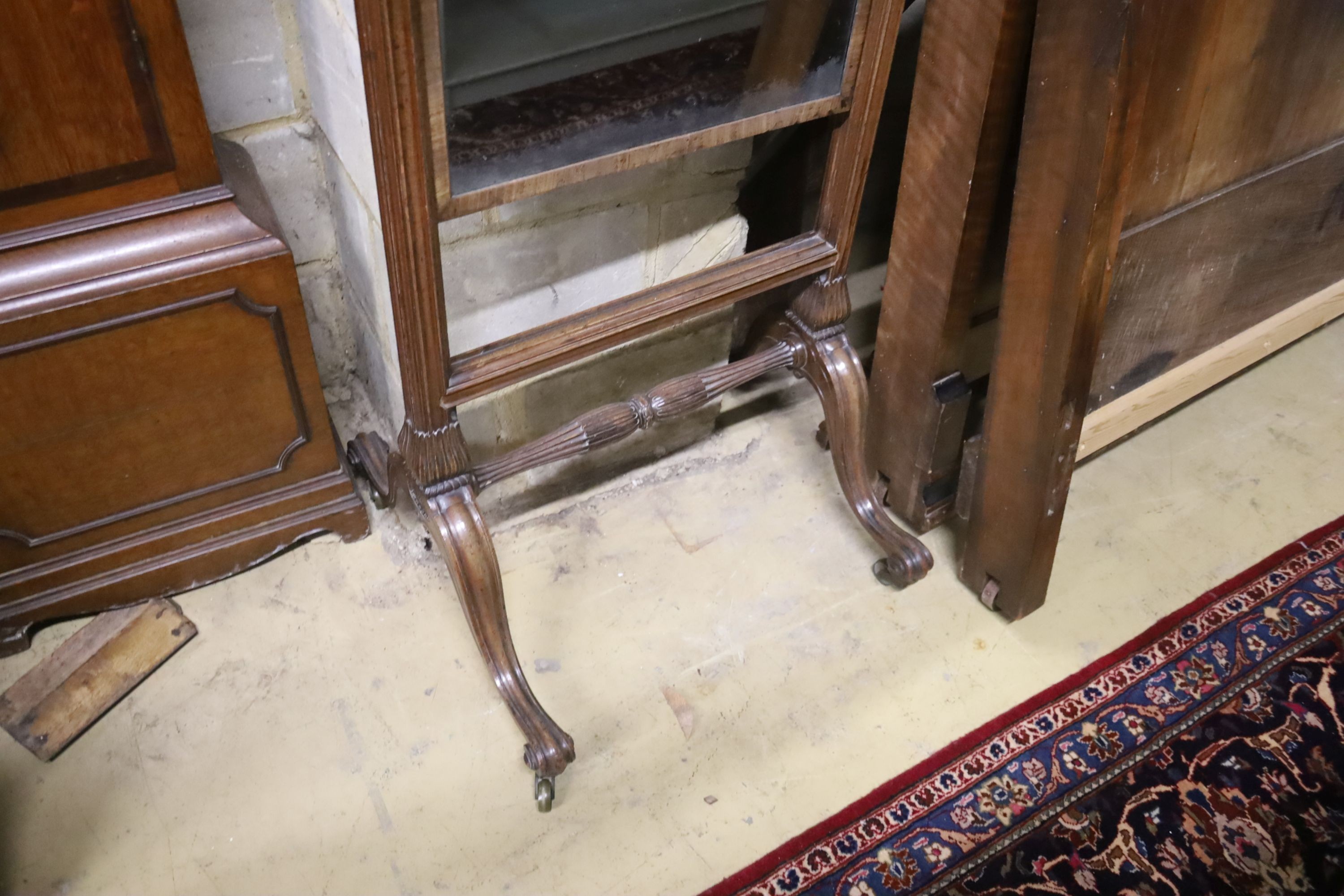 A Victorian mahogany adjustable cheval mirror, with rising plate, width 56cm